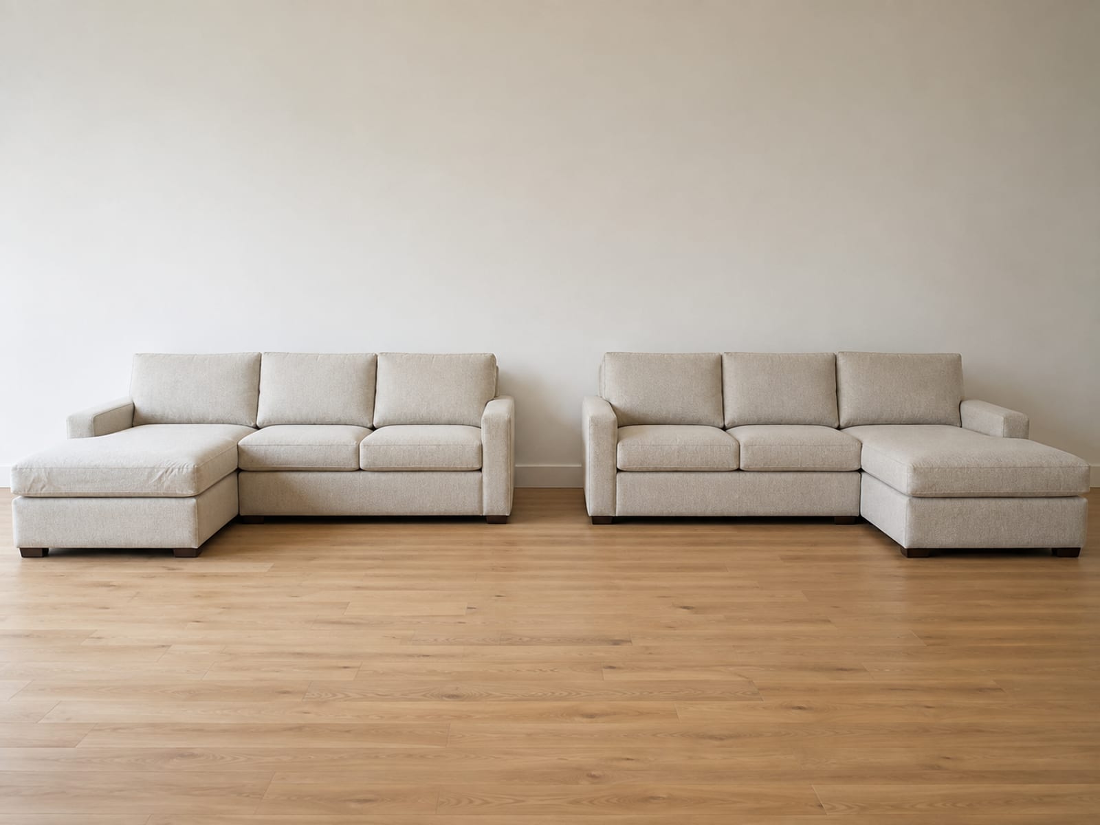 Two otherwise identical sectionals side by side, one with its chaise on the left and one with its chaise on the right
