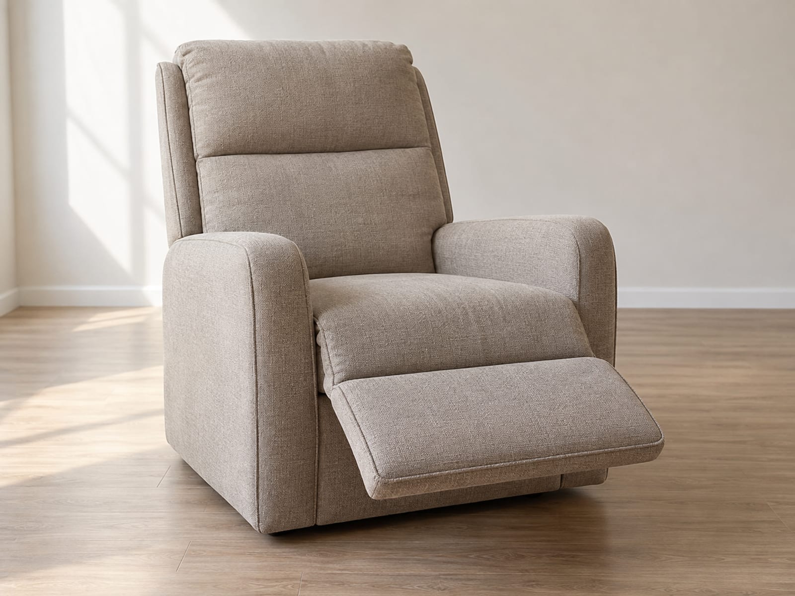An upholstered lift chair with its back held fully upright while its footrest is raised to full extension at the same time, a position only a chair with separate motors for back and footrest can hold, photographed from a front three-quarter angle at standing height in a plain daylit room