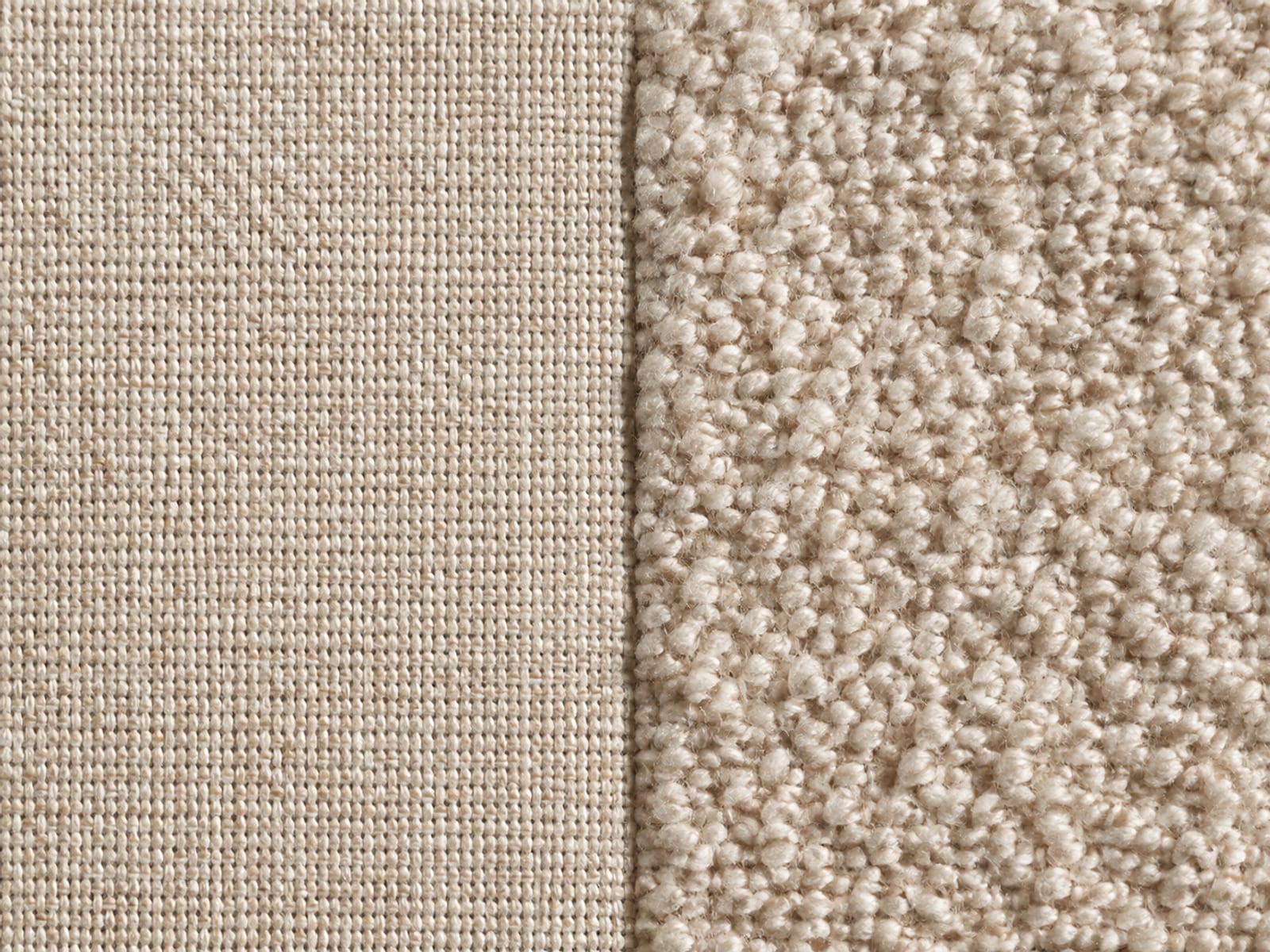 Two upholstery surfaces meeting down the middle of the frame, a tight flat weave on the left and a looped boucle on the right