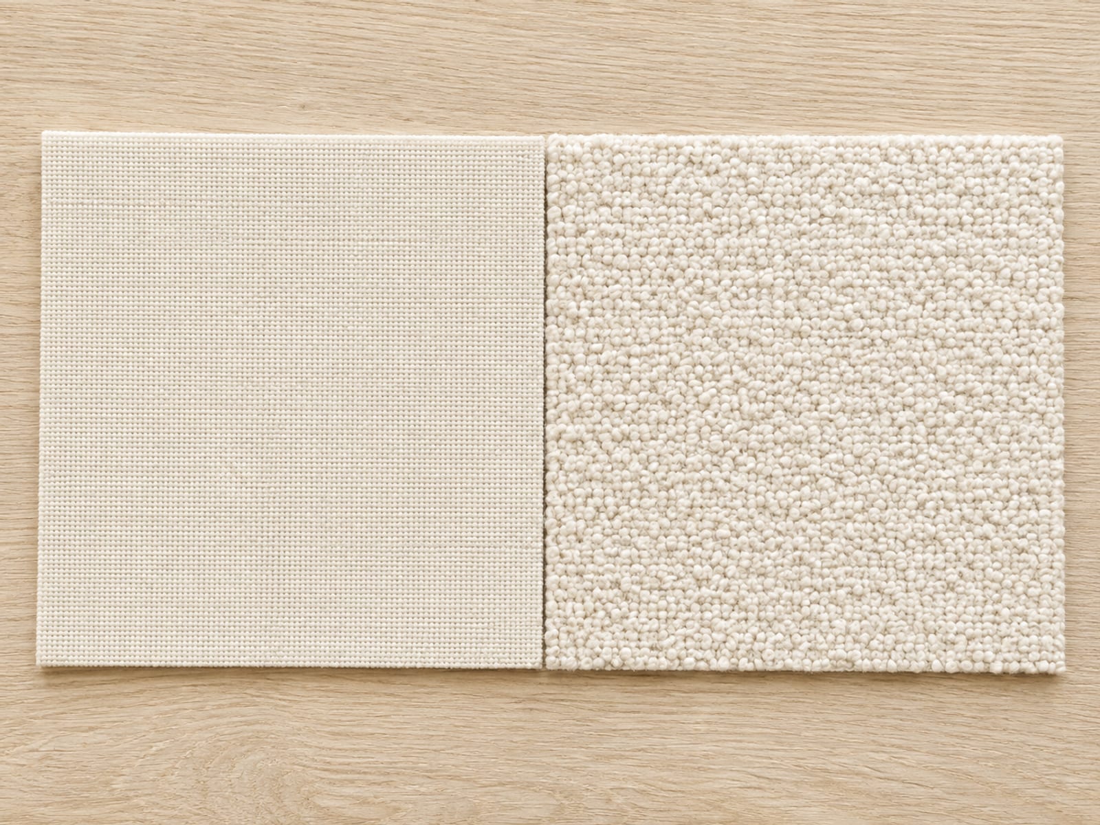 Two upholstery swatches of the same pale color lying side by side, the left a flat tight performance weave and the right a deeply looped boucle